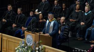 Foster care to 110 countries: cyber leader Jim West earns WGU degree he promised his daughters